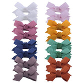 Sugarmelon boutique baby hair clip fringe bangs close-up demonstrates secure snap for fine hair