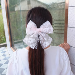 Sugarmelon cottagecore bow on hair enhances whimsical everyday outfits.
