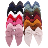 Sugarmelon Fable bow corduroy velvet clip on a toddler's head for everyday style.