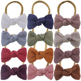 Sugarmelon linen bow headband closeup shows soft linen texture for sensitive skin