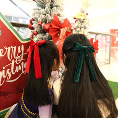 Sugarmelon white velvet bow clip complements winter looks.