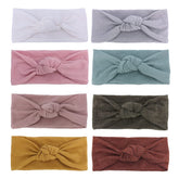 Sugarmelon mustard knot headband on baby, soft and stretchy for daily wear.