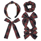 Sugarmelon tartan bow long-tail clip adds festive flair to daily outfits.