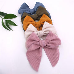 Sugarmelon corduroy velvet bow clipped for baby show or party look.