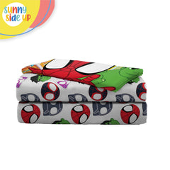Sunny Side Up Spidey Ghost Spider print in a child's bed for playful vibes