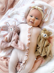 SUNSHINE & SNUGGLES Lovey pink bunny travel-friendly image demonstrates compact security on the go.