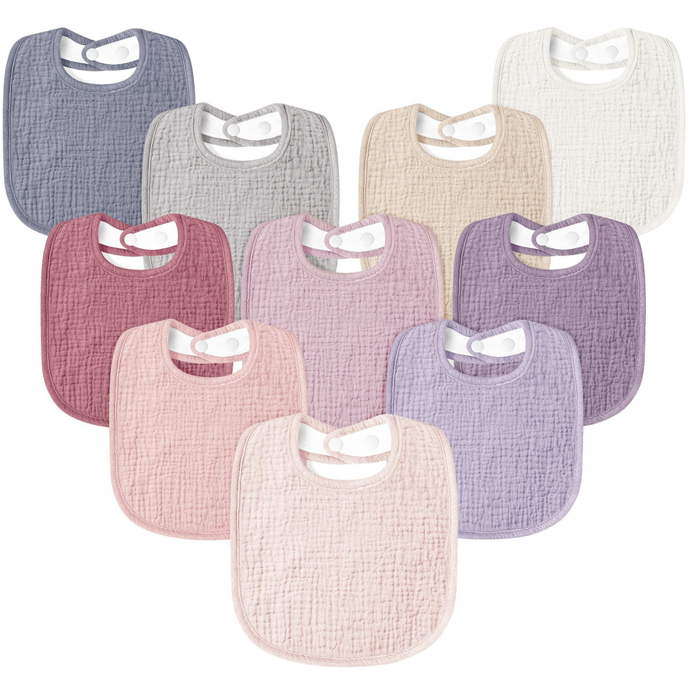 Susurration bib with adjustable snaps in pink for a snug fit.