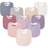 Susurration bib with adjustable snaps in pink for a snug fit.