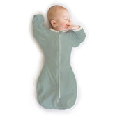 SwaddleDesigns Transitional Swaddle Sack arm-up half-sleeve view for calmer sleep.