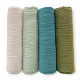 SwaddleDesigns Oceana muslin swaddle blanket folded, showcasing soft texture and versatility.