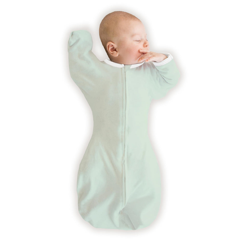 SwaddleDesigns arm-up sleeve design promotes self-soothing and safer rollover transitions.