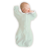 SwaddleDesigns arm-up sleeve design promotes self-soothing and safer rollover transitions.