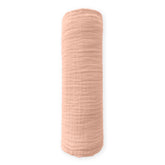 SwaddleDesigns Peach Blush muslin blanket close-up highlights breathable softness