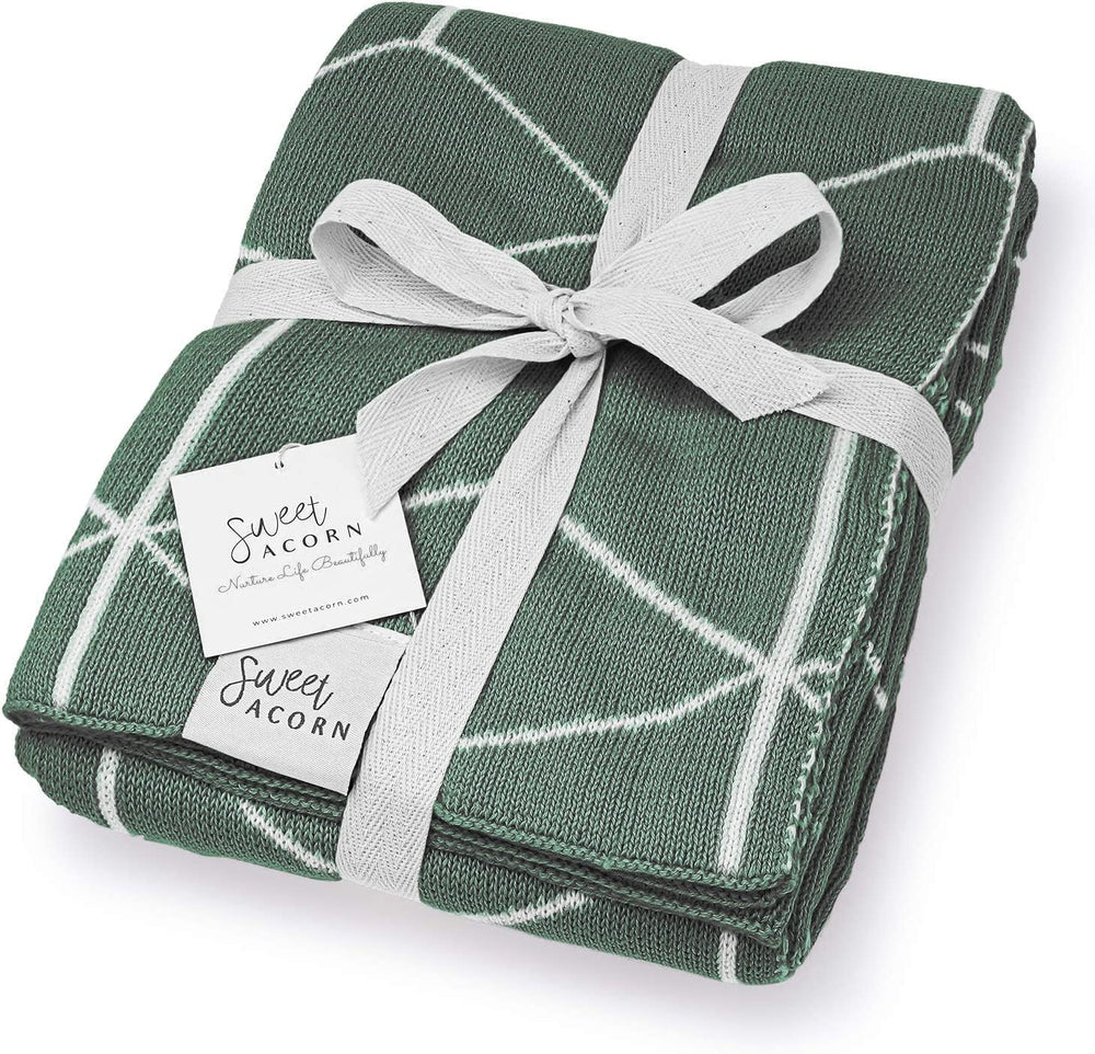 Sweet Acorn Knit Baby Blanket in Juniper Green with geometric pattern for cozy naps.