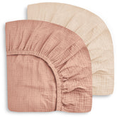 Sweet Dolphin 2-pack muslin crib sheets in packaging, showing value and easy setup.