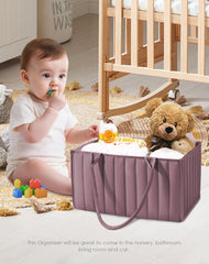 Sweet Dolphin diaper caddy with travel-ready handles for car trips and on-the-go care.