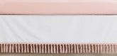 Sweet Jojo Designs boho crib skirt front view with blush fringe for cozy nursery style.