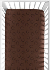 Sweet Jojo Designs fitted crib sheet with horseshoe print keeps baby cozy at nap time.