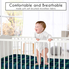 Sweet Jojo Designs green gingham on crib demonstrates secure snug fit for standard cribs