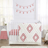 Sweet Jojo Designs mauve pink boho arrow crib blanket with tufted trim for cozy nursery vibes