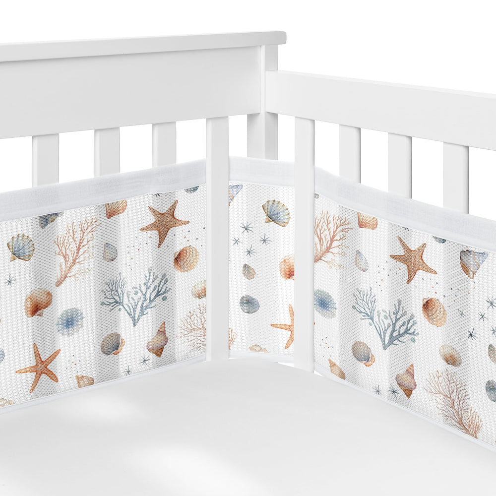 Sweet Jojo Designs Ocean Seashells long panel mesh crib liner keeps limbs inside for safety.