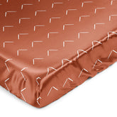 Sweet Jojo Designs satin crib sheet close-up showing hair-friction reduction.