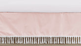 Sweet Jojo Designs pink boho crib skirt draped on a standard crib for a polished nursery.
