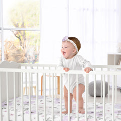 Sweet Jojo Designs Soft Nursery Sheet folded for quick swaps and rotation