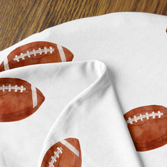Sweet Jojo Designs sports-themed nursery decor complements newborn feeding moments daily.