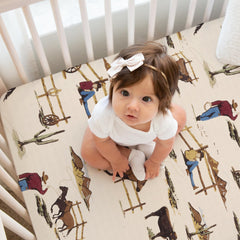 Sweet Jojo Designs cow-print sheets for cozy, breathable infant sleep space