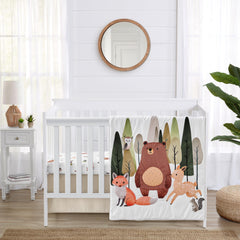 Sweet Jojo Designs woodland animals crib blanket shows cozy texture and soothing forest tones for bedtime.