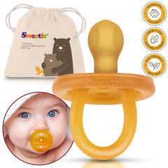 Sweetie rubber pacifier rounded nipple closeup shows soft, natural nipple for soothing