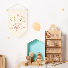 Sweety Baby canvas wall flag boosts boho theme in nursery.