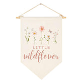 Sweety Baby wildflower banner over crib for cozy boho nursery decor.