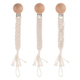 Symbolife Boho pacifier clip closeup showing wooden clips and braided cotton for secure use