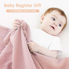Synrroe muslin swaddle blanket close-up highlights 100% cotton weave and soft touch.