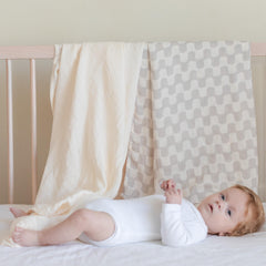TAB muslin swaddle large 47x47 inches for flexible use.
