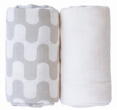 TAB muslin swaddle tan waves pattern offers versatile daily coverage.