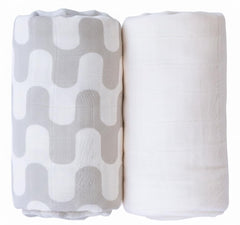 TAB muslin swaddle tan waves pattern offers versatile daily coverage.