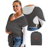 TAB stylish dark gray gold baby wrap worn by parent for ergonomic support and close bonding.