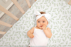 TADO MUSLIN green leaves close-up; soft, skin-friendly fabric for sensitive babies