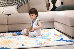 TADO MUSLIN 50x50 inch mat fits standard playpens for versatile use.