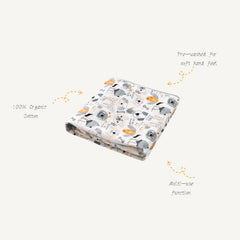 TADO MUSLIN swaddle blanket pup-design ideal for cozy swaddling and daily naps.