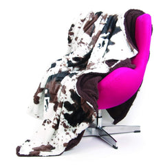 Tadpoles easy-care blanket demonstrates machine-washability and long-lasting softness after washing.