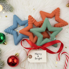 TalkTools Sensory Teeny Teether Star Ocean worn as necklace for on-the-go oral soothing