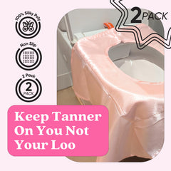 Tan Fan seat cover on toilet pink demonstrates large fit protecting legs and surface.