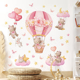 Tanlaby pink hot air balloon wall sticker adds dreamy nursery ambience.