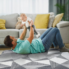 TANOSHII mat inside a playpen offering safe cushioned space.