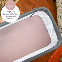 Tansy Panda machine-washable bassinet sheets ready for quick changes.