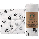 TATA AMG muslin swaddle blanket folded showing soft organic cotton for newborn comfort.